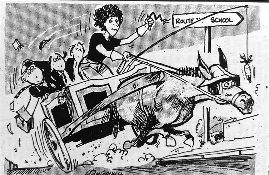Cartoon accompanying the column: A donkey cart careering past a signpost reading ROUTE 1 SCHOOL, four children and their satchels flying off the back.