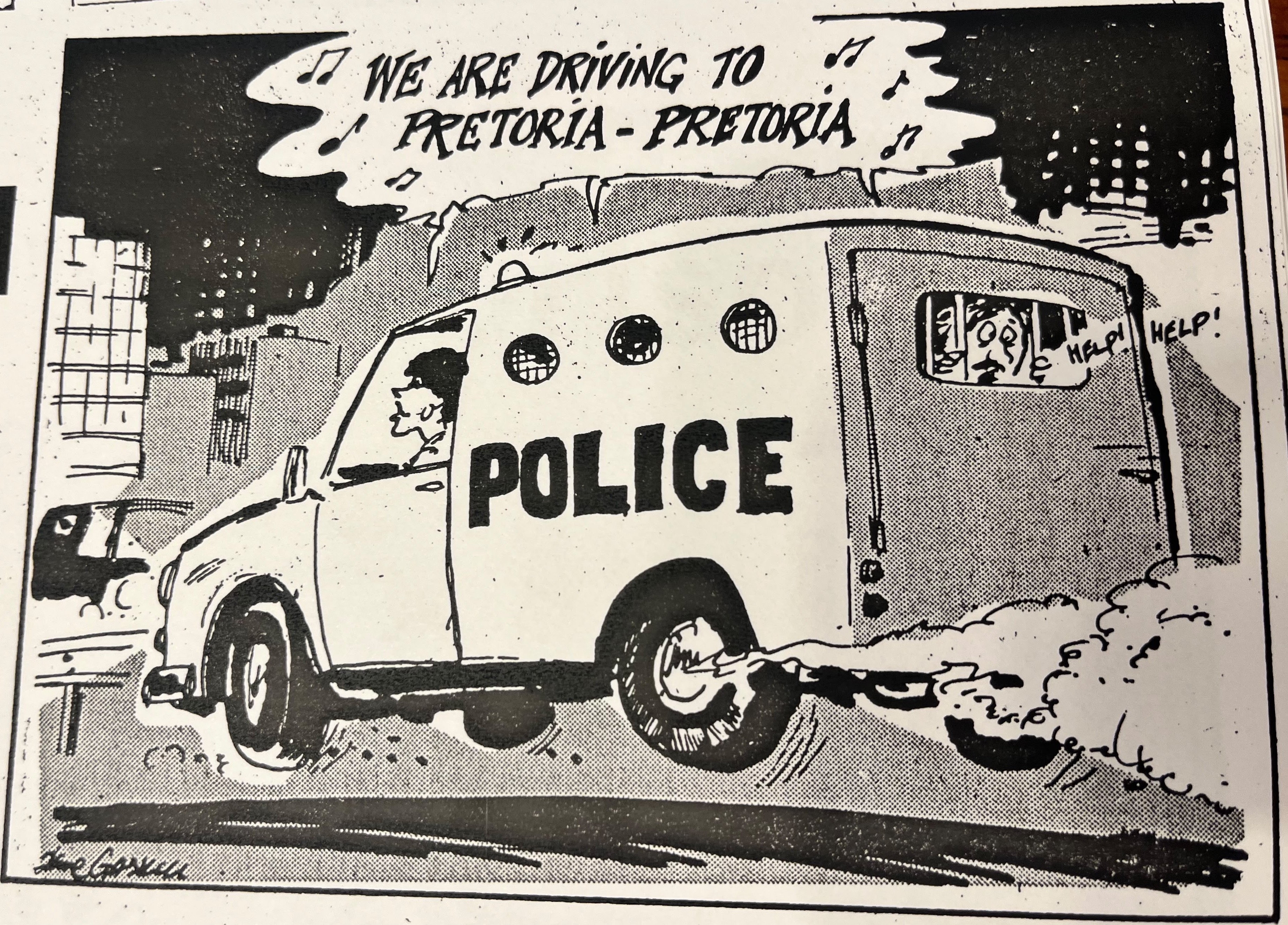 Cartoon accompanying the column: “We are driving to Pretoria - Pretoria.” Carol drives a police van; her passenger cries “Help! Help!” from behind bars.