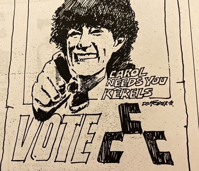 Cartoon accompanying the column: CAROL NEEDS YOU KERELS. VOTE CC.
